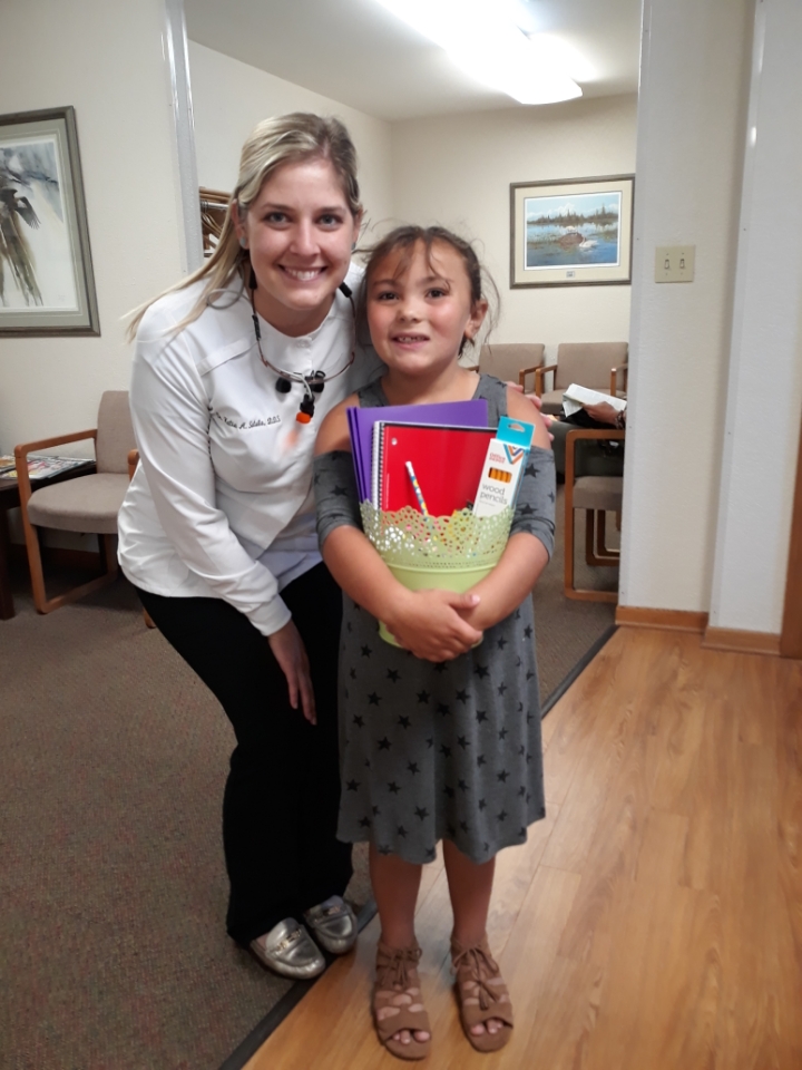 Dr. Satula with young patient